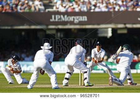 LONDON, ENGLAND. AUGUST 19 2012 South Africa's Imran Tahir sweeps the ball during the third Investec cricket  test match between England and South Africa, at Lords Cricket Ground