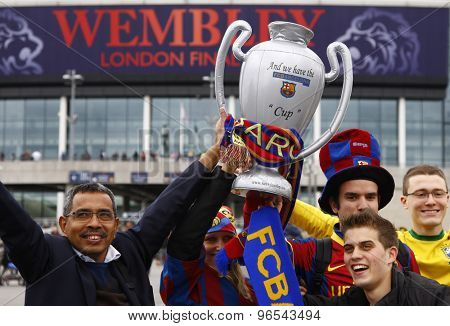 LONDON, ENGLAND. May 28 2011:   Fans in front of the Stadium prior to the 2011UEFA Champions League final between Manchester United and FC Barcelona, at Wembley Stadium