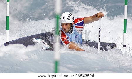 LONDON, ENGLAND - JUNE 06 2014 Ryan Westley of Great Britain competes at the ICF Canoe Slalom held at the Lea Valley White Water centre Waltham Abbey.