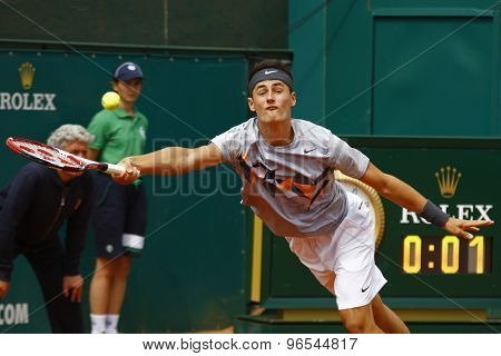 MONTE CARLO, MONACO. APRIL 16 2012 Bernard Tomic (AUS) in action during the first round match between Bernard Tomic (AUS) and Denis Istomin (UZB) at the ATP Monte Carlo Masters  