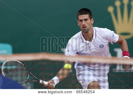 MONTE CARLO, MONACO. APRIL 19 2012 Novak Djokovic (SRB) in action during the 3rd round singles match between Novak Djokovic (SRB) and Alexandr Dolgopolov (UKR) at the ATP Monte Carlo Masters  .