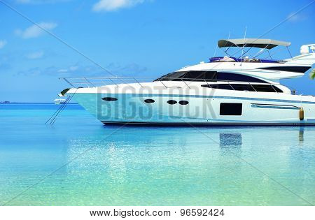 Yacht parked at jetty in Baros Maldives