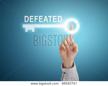 Male Hand Pressing Defeated Key Button