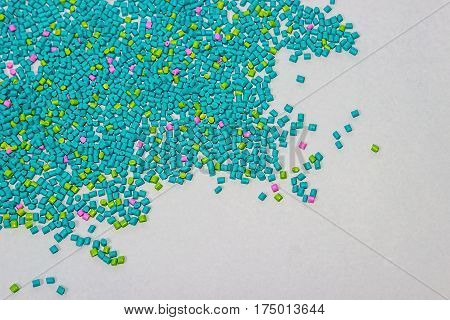 Polymeric dye. Plastic pellets. Colorant for plastics. Pigment in the granules.  Polymer beads
