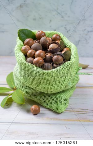 Macadamia nuts harvest close up with leaves