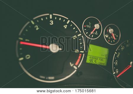 Close up image of a car's dashboard indicating a very high fuel consumption.