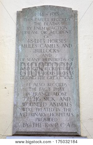 LONDON UK - 16TH FEBRUARY 2017: A memorial plaque on the facade of the Animal War Memorial Dispensary in Kilburn London, on 16th February 2017. It commemorates the deaths inflicted on animals during the Great War.