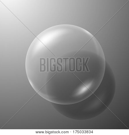 Transparent soap bubble on dark grey background