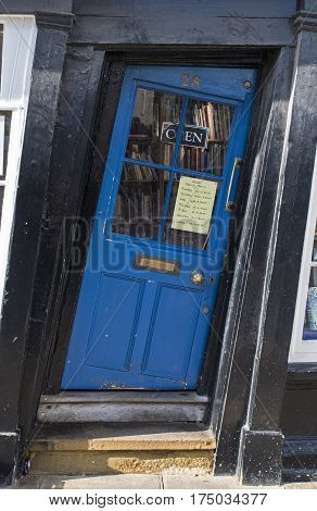 CANTERBURY UK - FEBRUARY 13TH 2017: A slanted door to a shop in the historic city of Canterbury in the UK on 13th February 2017.
