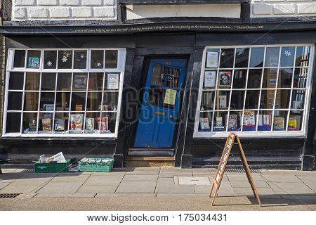 CANTERBURY UK - FEBRUARY 13TH 2017: A slanted door to a bookshop in the historic city of Canterbury in the UK on 13th February 2017.