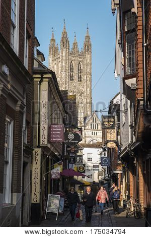 CANTERBURY UK - FEBRUARY 13TH 2017: A view of the historic Canterbury Cathedral through the narrow streets of Canterbury in Kent on 13th February 2017.