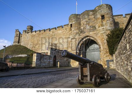 A view of the historic Lincoln Castle in Lincoln UK. The Castle was constructed by William the Conqueror in the 11th Century.