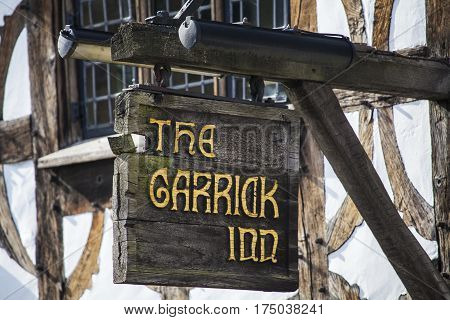 STRATFORD-UPON-AVON UK - MARCH 2ND 2017: The sign above the main entrance to the Garrick Inn Public House in Stratford-Upon-Avon on 2nd March 2017. It is reputedly the oldest pub in the town.