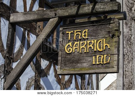 STRATFORD-UPON-AVON UK - MARCH 2ND 2017: The sign above the main entrance to the Garrick Inn Public House in Stratford-Upon-Avon on 2nd March 2017. It is reputedly the oldest pub in the town.