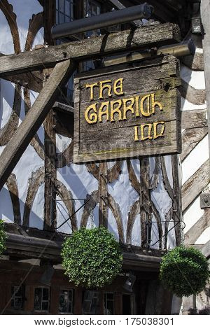 STRATFORD-UPON-AVON UK - MARCH 2ND 2017: The sign above the main entrance to the Garrick Inn Public House in Stratford-Upon-Avon on 2nd March 2017. It is reputedly the oldest pub in the town.
