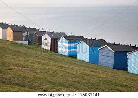 colored beach huts on the beach of Tankerton near Whitstable in Kent, UK
