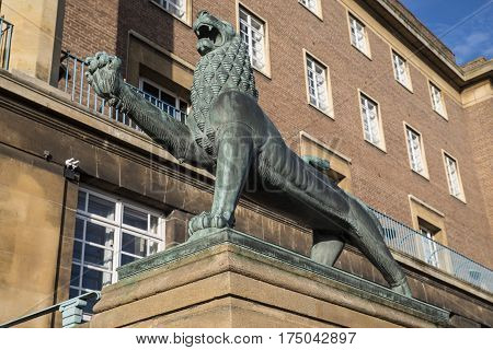 A heraldic lion outside the entrance to Norwich City Hall in the historic city of Norwich UK.