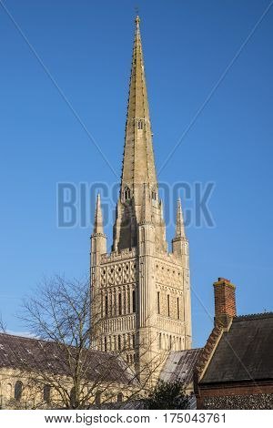 A view of the spire of the magnificent Norwich Cathedral in the historic city of Norwich UK.
