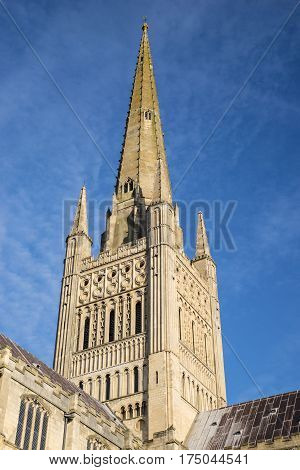 A view of the spire of the magnificent Norwich Cathedral in the historic city of Norwich UK.
