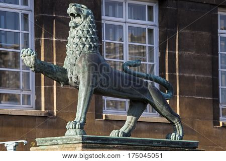 A heraldic lion outside the entrance to Norwich City Hall in the historic city of Norwich UK.