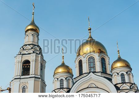 Golden domes of the Orthodox church against the blue sky, Voronezh, Russia