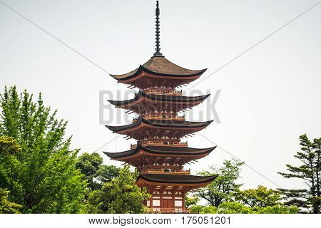White sky and Japan pagoda over the treessky