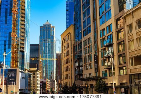 SEATTLE WA - SEPTEMBER 11 2016: A view south down 2nd Street from just north of Pine Street shows postmodern skyscrapers and new construction in this booming western city.