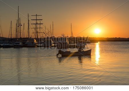 SOZOPOL, BULGARIA - JULY 11, 2016: Amazing Sunset at the port of Sozopol, Burgas Region, Bulgaria