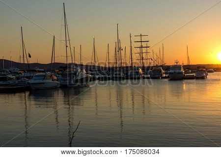 SOZOPOL, BULGARIA - JULY 11, 2016: Amazing Sunset at the port of Sozopol, Burgas Region, Bulgaria