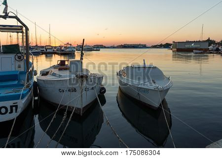 SOZOPOL, BULGARIA - JULY 11, 2016: Amazing Sunset at the port of Sozopol, Burgas Region, Bulgaria