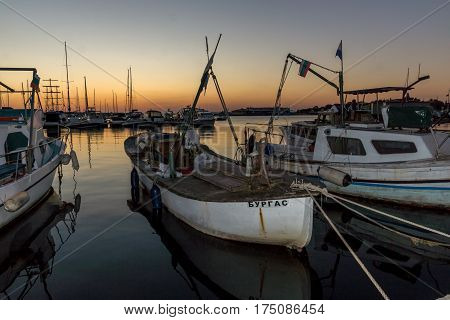 SOZOPOL, BULGARIA - JULY 11, 2016: Amazing Sunset at the port of Sozopol, Burgas Region, Bulgaria