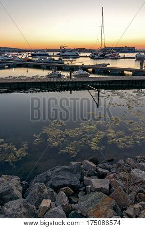 SOZOPOL, BULGARIA - JULY 11, 2016: Amazing Sunset at the port of Sozopol, Burgas Region, Bulgaria