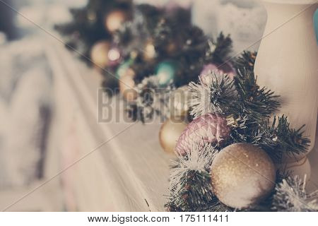 Christmas toys on a Christmas tree under snow