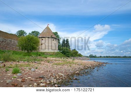Ancient Royal tower on the bank of Neva river in the sunny summer day. Fortress Oreshek. Leningrad region, Russia