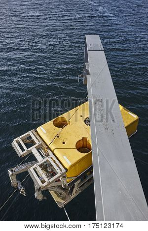 Scientific submarine robot with crane ready to be submerged. Research