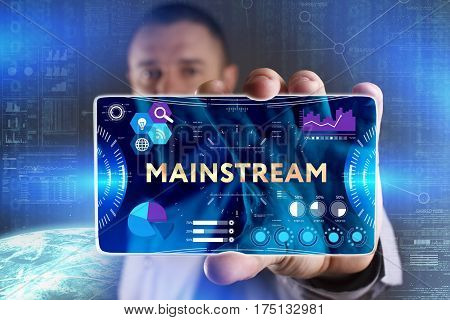 Business, Technology, Internet And Network Concept. Young Businessman Showing A Word In A Virtual Ta