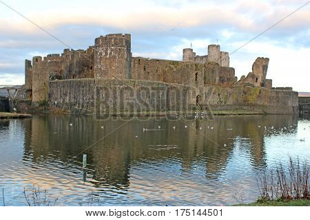 Caerphilly castle reflected in the lake, Wales