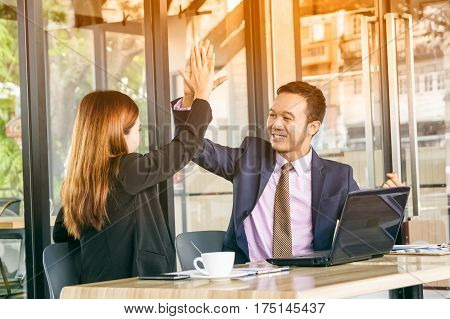 Happy Businesspeople Celebrating With Arms Up In The Office,success Business Concept