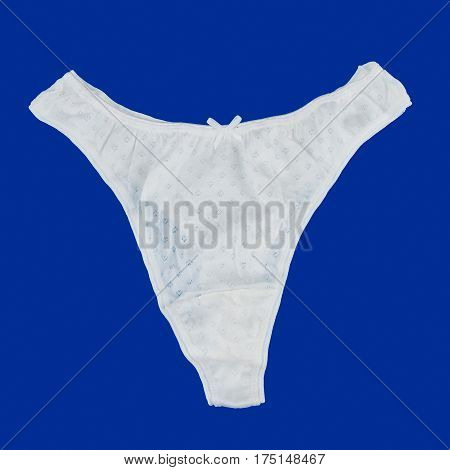 White panties on blue background with bow