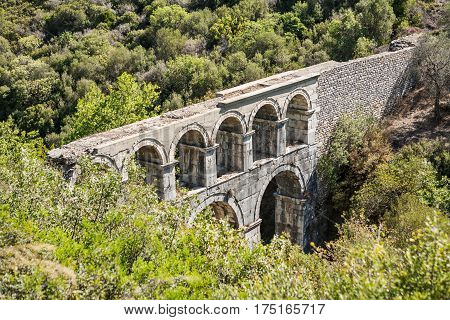 Ruins of ancient Pollio aqueduct bringe in Izmir Province. Turkey