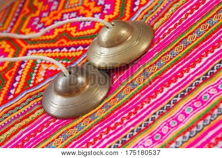 tibetan bell tingsha on handmade fabric  .