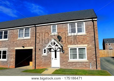 EASTFIELD, SCARBOROUGH, NORTH YORKSHIRE, ENGLAND - 10th of October 2016: New build housing estate pictureed in Scarborough on 10th October 2016. Exterior of new unoccupied houses.