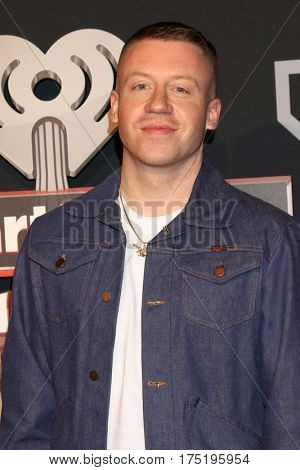 LOS ANGELES - MAR 5:  Macklemore, aka Ben Haggerty at the 2017 iHeart Music Awards at Forum on March 5, 2017 in Los Angeles, CA