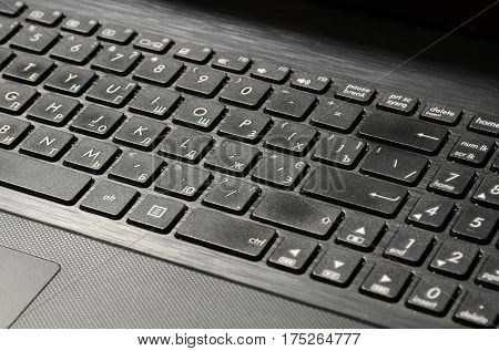 Fagment of the keyboard, which has Russian and English alphabets.
