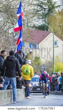 Conflans-Sainte-HonorineFrance-March 62016: The Ethiopian cyclist Tsgabu Gebremaryam Grmay of Lampre-Merida Team riding during the prologue stage of Paris-Nice 2016.