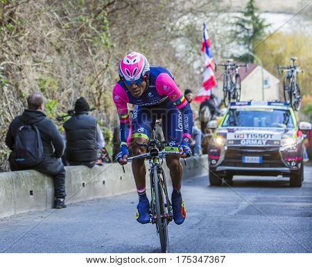 Conflans-Sainte-HonorineFrance-March 62016: The Ethiopian cyclist Tsgabu Gebremaryam Grmay of Lampre-Merida Team riding during the prologue stage of Paris-Nice 2016.