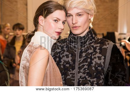 MILAN ITALY - FEBRUARY 25: Gorgeous models pose in the backstage just before Cividini show during Milan Women's Fashion Week on FEBRUARY 25 2017 in Milan.