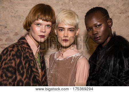 MILAN ITALY - FEBRUARY 25: Gorgeous models pose in the backstage just before Cividini show during Milan Women's Fashion Week on FEBRUARY 25 2017 in Milan.