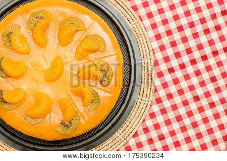 Orange cake on the wooden desk,homemade barkery