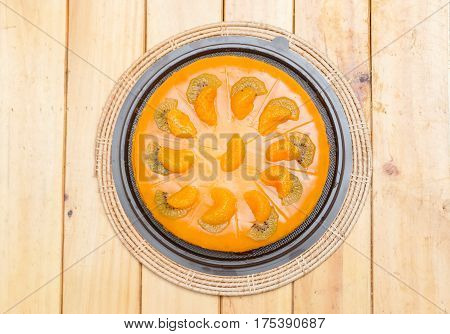 Orange cake on the wooden desk,homemade barkery